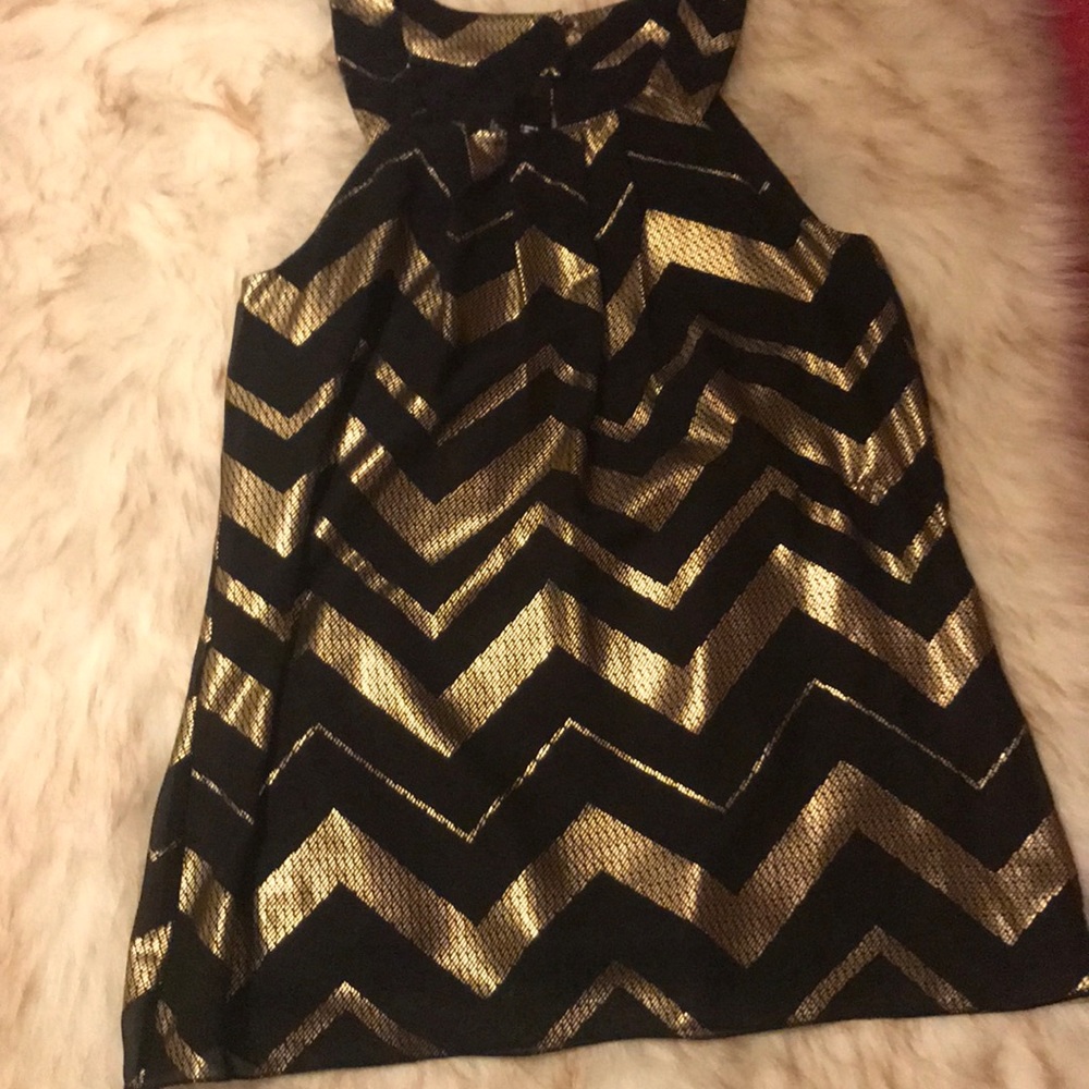 Black and gold formal blouse.